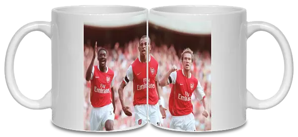 Gilberto celebrates scoring Arsenal goal with Alex Hleb and Kolo Toure