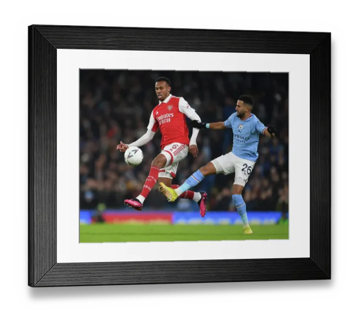Framed Print : Gabriel Magalhaes vs Riyad Mahrez: A Battle for the Ball in the FA Cup Clash between Manchester City and Arsenal (2022-23) Framed Print : Gabriel Magalhaes vs Riyad Mahrez: A Battle for the Ball in the FA Cup Clash between Manchester City and Arsenal (2022-23)