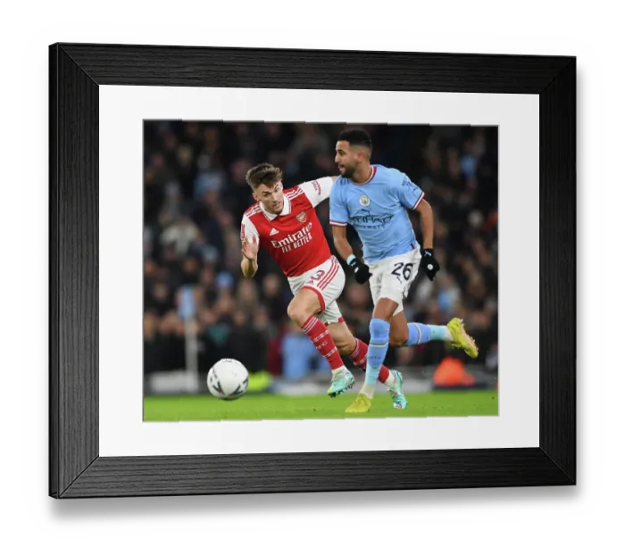 Framed Print : Arsenal's Kieran Tierney Closes In on Manchester City's Riyad Mahrez in FA Cup Clash Framed Print : Arsenal's Kieran Tierney Closes In on Manchester City's Riyad Mahrez in FA Cup Clash