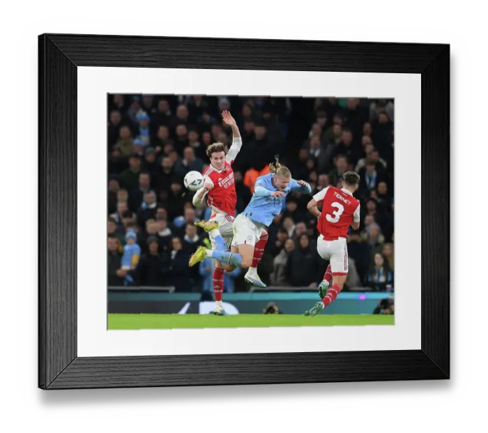 Framed Print : Rivalry Renewed: Holding Faces Haaland in FA Cup Battle - Manchester City vs Arsenal (2022-23)