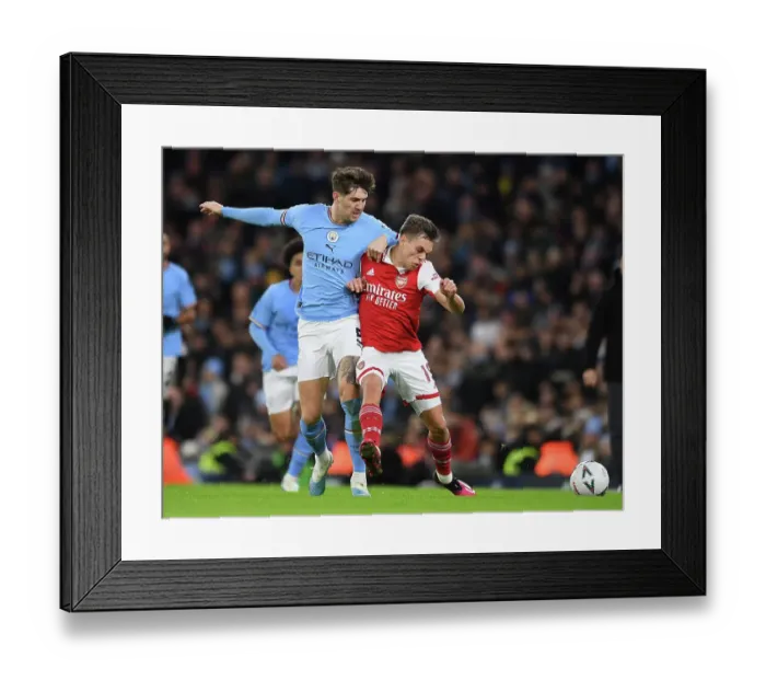Framed Print : Trossard vs. Stones: A FA Cup Showdown at Etihad Stadium Framed Print : Trossard vs. Stones: A FA Cup Showdown at Etihad Stadium