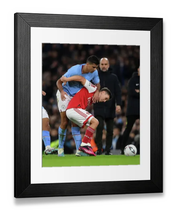 Framed Print : Manchester City vs Arsenal: Trossard vs Rodrigo - Emirates FA Cup Fourth Round Clash