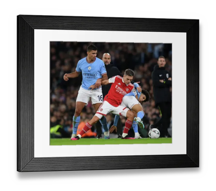 Framed Print : FA Cup Showdown: Trossard vs Rodrigo - Manchester City vs Arsenal Framed Print : FA Cup Showdown: Trossard vs Rodrigo - Manchester City vs Arsenal