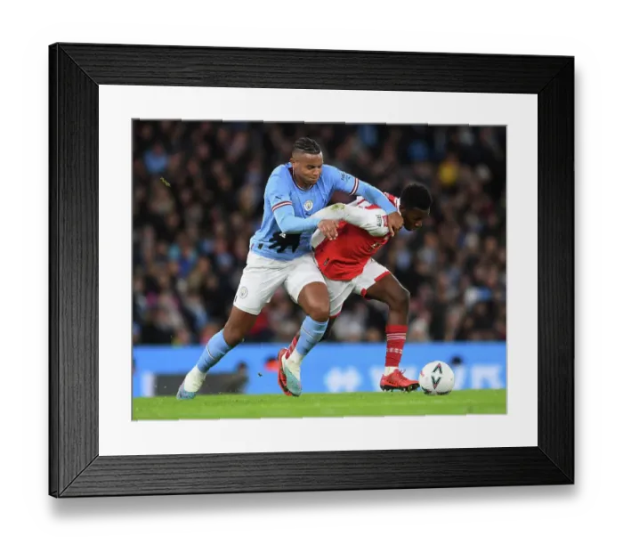 Framed Print : Clash of Titans: Manchester City vs. Arsenal - FA Cup Fourth Round Showdown Framed Print : Clash of Titans: Manchester City vs. Arsenal - FA Cup Fourth Round Showdown