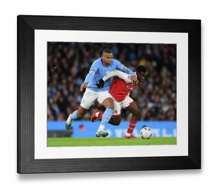 Framed Print : Arsenal's Eddie Nketiah Faces Off Against Manchester City's Manuel Akanji in FA Cup Clash