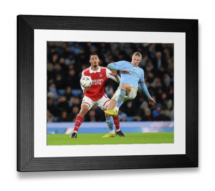 Framed Print : Clash of Titans: Saliba's Defiant Stand Against Haaland in FA Cup Showdown (Manchester City vs Arsenal, 2022-23)