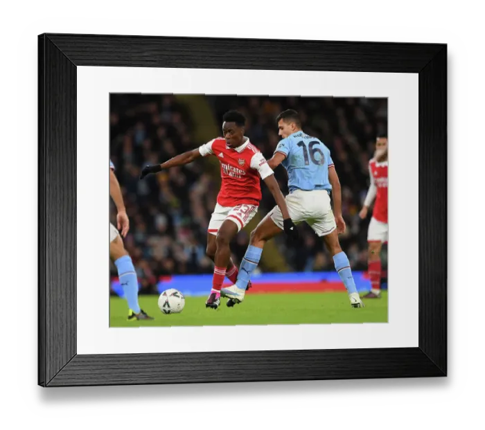 Framed Print : Arsenal's Albert Sambi Lokonga Battles Rodrigo in FA Cup Showdown: Manchester City vs. Arsenal (2022-23) Framed Print : Arsenal's Albert Sambi Lokonga Battles Rodrigo in FA Cup Showdown: Manchester City vs. Arsenal (2022-23)