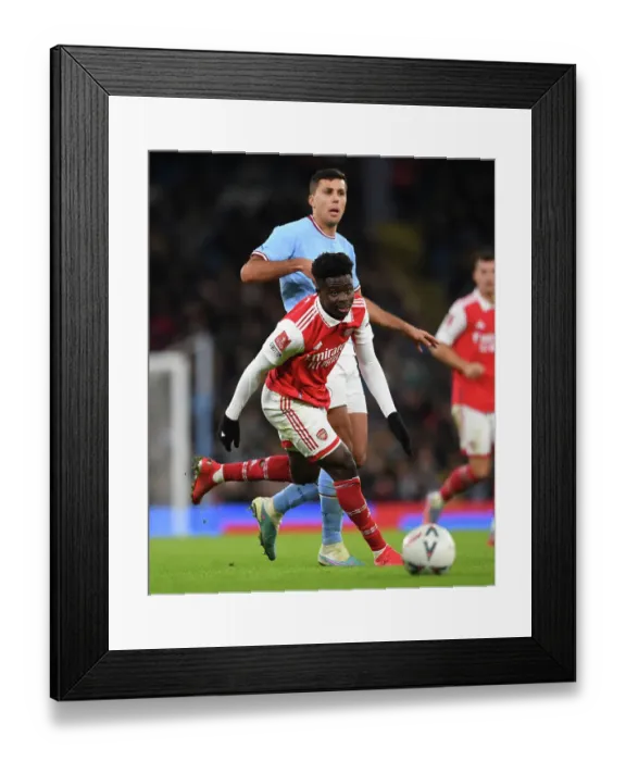 Framed Print : Arsenal's Bukayo Saka Steals the Show in FA Cup Battle against Manchester City Framed Print : Arsenal's Bukayo Saka Steals the Show in FA Cup Battle against Manchester City