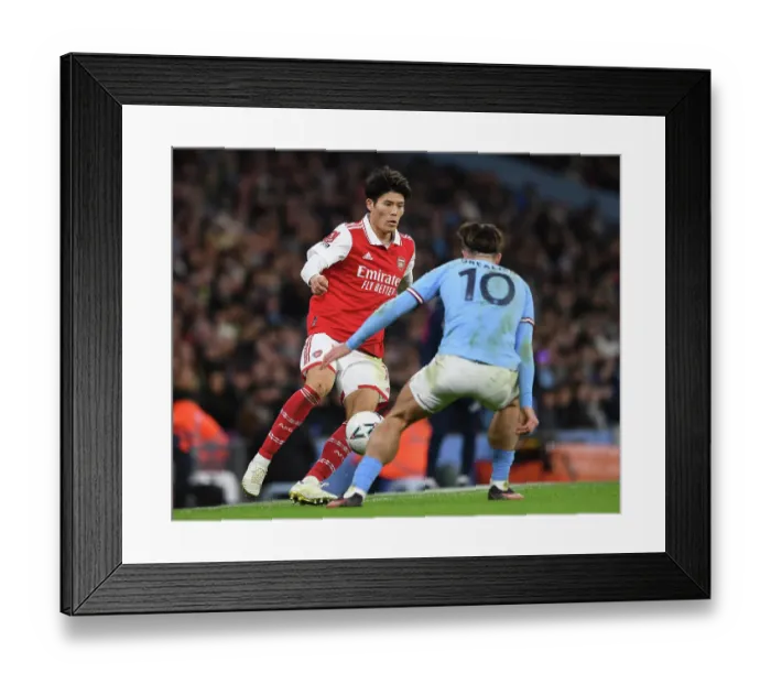 Framed Print : Clash at the Etihad: Tomiyasu vs. Grealish in the FA Cup Showdown (Manchester City vs. Arsenal, 2022-23) Framed Print : Clash at the Etihad: Tomiyasu vs. Grealish in the FA Cup Showdown (Manchester City vs. Arsenal, 2022-23)