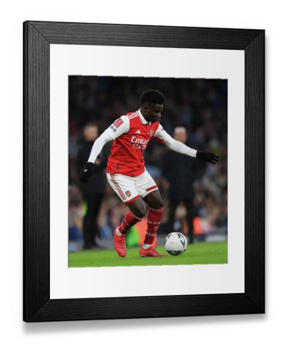 Framed Print : Bukayo Saka in Action: Manchester City vs. Arsenal - Emirates FA Cup Fourth Round, 2022-23