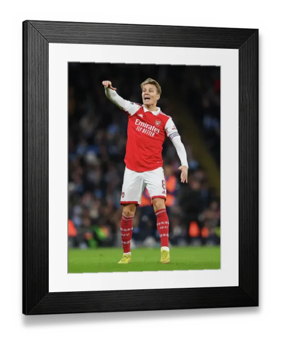 Framed Print : Martin Odegaard vs Manchester City: Arsenal's Midfield Star Faces Premier Rival in FA Cup Showdown Framed Print : Martin Odegaard vs Manchester City: Arsenal's Midfield Star Faces Premier Rival in FA Cup Showdown