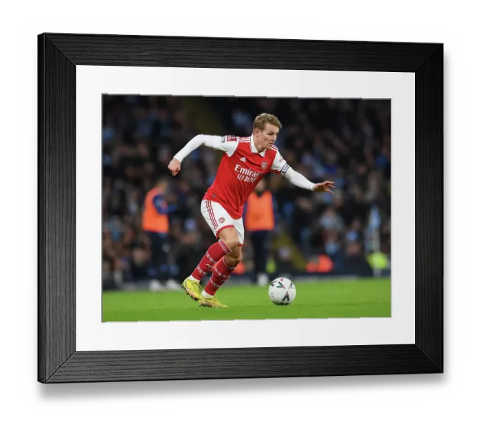Framed Print : Martin Odegaard Faces Manchester City in FA Cup Clash Framed Print : Martin Odegaard Faces Manchester City in FA Cup Clash