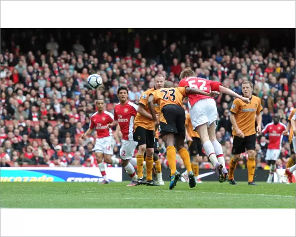Nicklas Bendtner heads past Ronald Zubar to score the Arsenal goal. Arsenal 1
