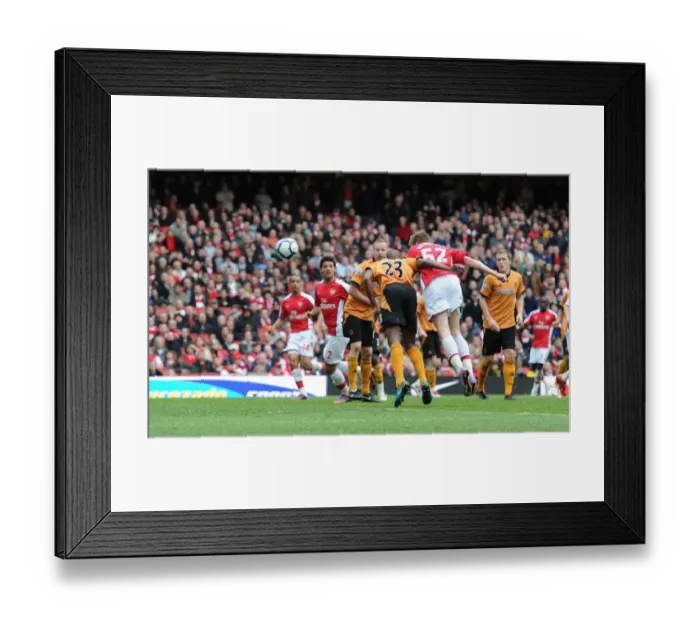 Framed Print : Nicklas Bendtner heads past Ronald Zubar to score the Arsenal goal. Arsenal 1 Framed Print : Nicklas Bendtner heads past Ronald Zubar to score the Arsenal goal. Arsenal 1