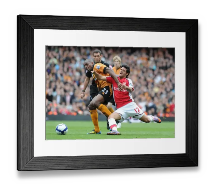 Framed Print : Carlos Vela (Arsenal) Roland Zubar (Wolves). Arsenal 1: 0 Wolverhampton Wanderers