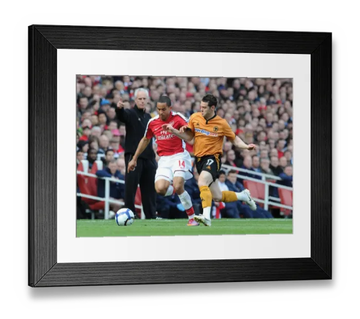 Framed Print : Theo Walcott (Arsenal) Matthew Jarvis (Wolves). Arsenal 1: 0 Wolverhampton Wanderers Framed Print : Theo Walcott (Arsenal) Matthew Jarvis (Wolves). Arsenal 1: 0 Wolverhampton Wanderers