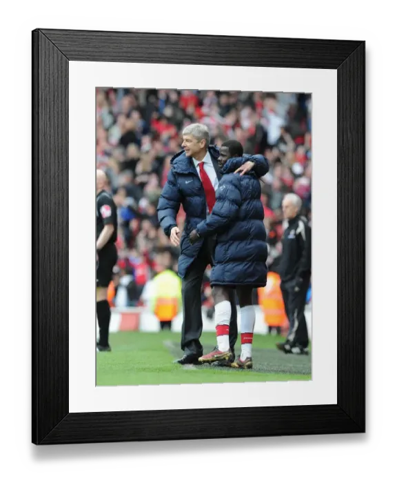Framed Print : Manager Arsene Wenger celebrates the Arsenal goal with Emmanuel Eboue. Arsenal 1 Framed Print : Manager Arsene Wenger celebrates the Arsenal goal with Emmanuel Eboue. Arsenal 1