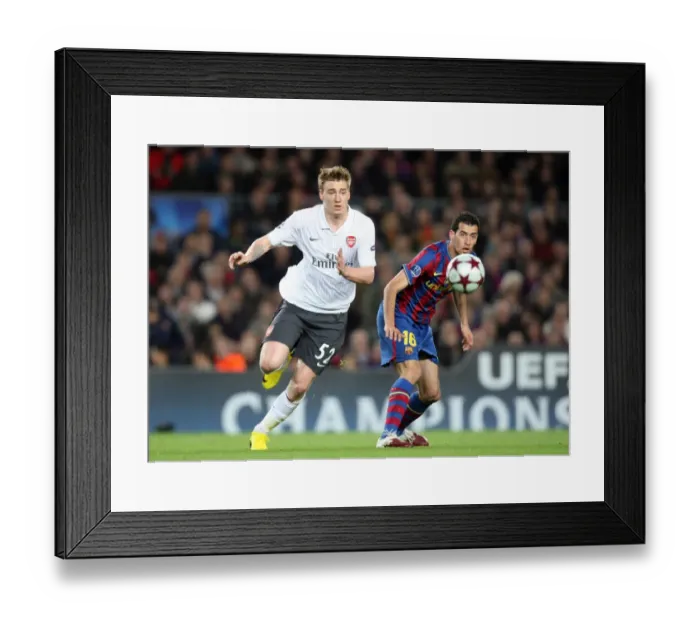 Framed Print : Nicklas Bendtner (Arsenal) Sergio Basquets (Barcelona). Barcelona 4: 1 Arsenal