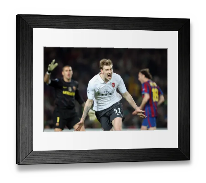 Framed Print : Nicklas Bendtner's Euphoric Moment: Arsenal's Goal in Barcelona's Den, 4-1 UCL Quarterfinal
