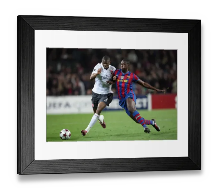 Framed Print : Abou Diaby vs Yaya Toure: Barcelona's Dominance in the 2010 UEFA Champions League Quarterfinals (4-1) Framed Print : Abou Diaby vs Yaya Toure: Barcelona's Dominance in the 2010 UEFA Champions League Quarterfinals (4-1)