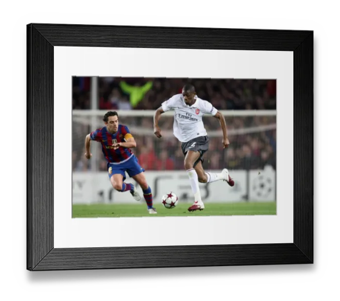 Framed Print : Abou Diaby vs Xavi: Barcelona's Dominance Over Arsenal in the 2010 UEFA Champions League Quarterfinals Framed Print : Abou Diaby vs Xavi: Barcelona's Dominance Over Arsenal in the 2010 UEFA Champions League Quarterfinals