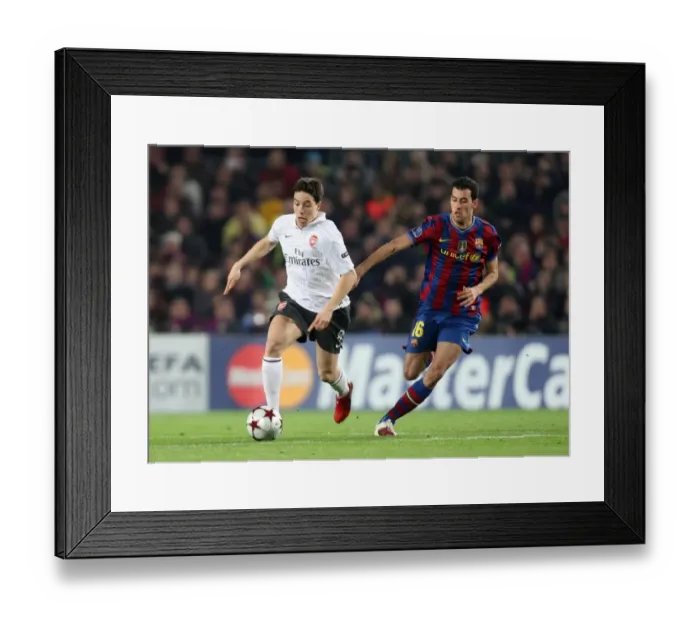 Framed Print : Samir Nasri (Arsenal) Sergio Basquets (Barcelona). Barcelona 4: 1 Arsenal Framed Print : Samir Nasri (Arsenal) Sergio Basquets (Barcelona). Barcelona 4: 1 Arsenal