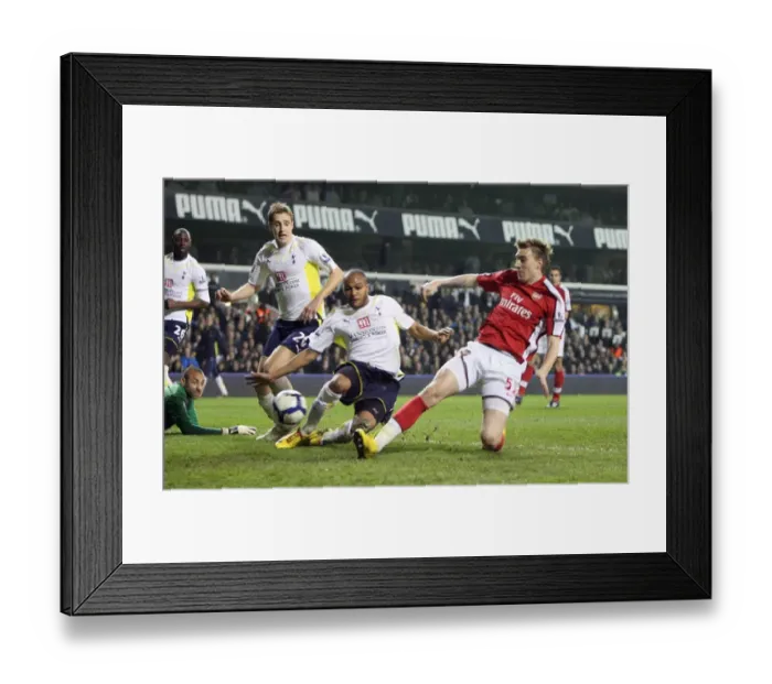 Framed Print : Nicklas Bendtner scores Arsenals goal under pressure from Younes Kaboul (Tottenham) Framed Print : Nicklas Bendtner scores Arsenals goal under pressure from Younes Kaboul (Tottenham)