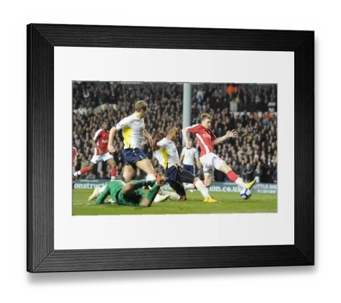 Framed Print : Nicklas Bendtner shoots past Tottenhams Heurelho Gomes, Younes Kaboul Framed Print : Nicklas Bendtner shoots past Tottenhams Heurelho Gomes, Younes Kaboul