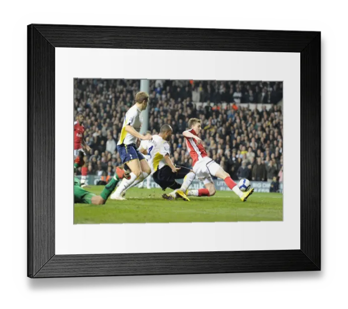 Framed Print : Bendtner's Unforgettable Strike: Arsenal's Comeback Goal Against Tottenham, 14-15 Season