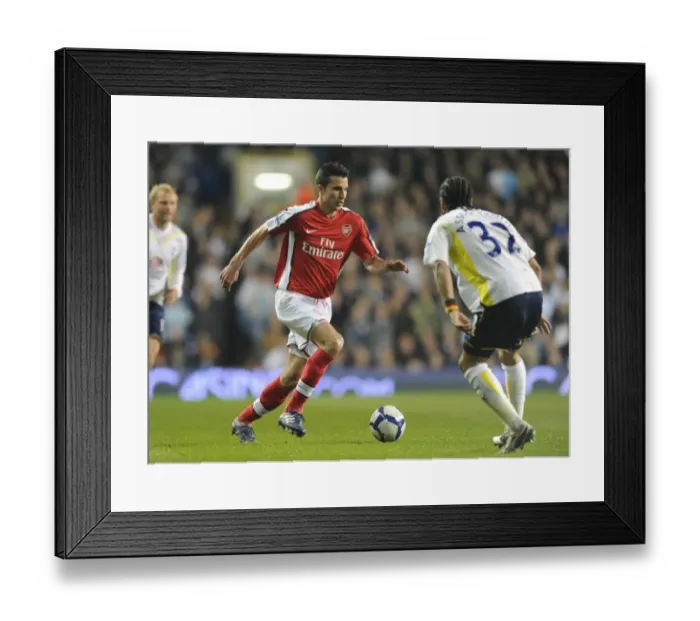 Framed Print : Robin van Persie (Arsenal) Beniot Assou-Ekotto (Tottenham). Tottenham Hotspur 2: 1 Arsenal Framed Print : Robin van Persie (Arsenal) Beniot Assou-Ekotto (Tottenham). Tottenham Hotspur 2: 1 Arsenal