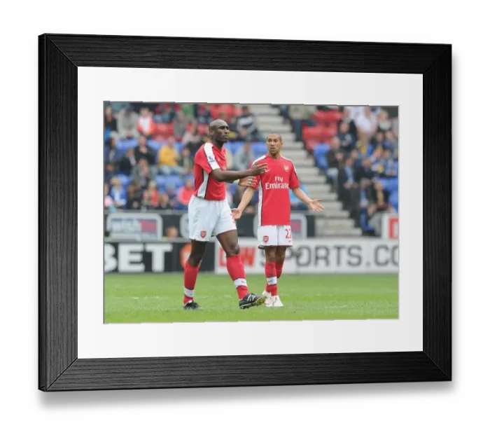 Framed Print : Sol Campbell and Gael Clichy (Arsenal). Wigan Athletic 3: 2 Arsenal, FA Barclays Premier League Framed Print : Sol Campbell and Gael Clichy (Arsenal). Wigan Athletic 3: 2 Arsenal, FA Barclays Premier League