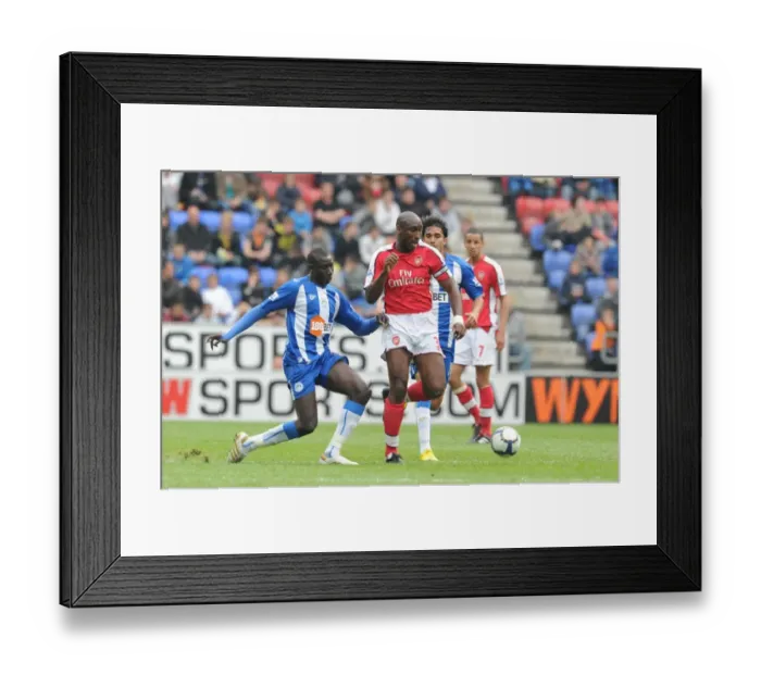 Framed Print : Sol Campbell (Arsenal) Mohamed Diame (Wigan). Wigan Athletic 3: 2 Arsenal Framed Print : Sol Campbell (Arsenal) Mohamed Diame (Wigan). Wigan Athletic 3: 2 Arsenal
