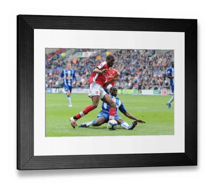 Framed Print : Diaby vs. Figueroa: Wigan Athletic's Upset Over Arsenal (3-2)