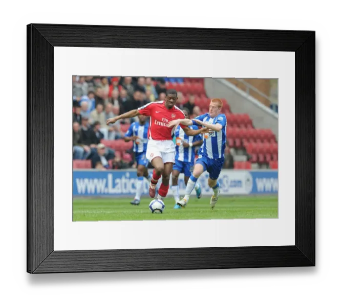 Framed Print : Diaby vs Watson: Wigan's Upset Over Arsenal in FA Premier League (3-2) Framed Print : Diaby vs Watson: Wigan's Upset Over Arsenal in FA Premier League (3-2)