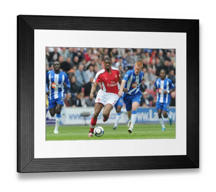 Framed Print : Diaby vs Watson: Wigan Athletic's Upset over Arsenal in FA Premier League (3:2)