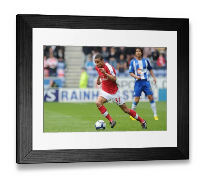 Framed Print : Craig Eastmond (Arsenal). Wigan Athletic 3: 2 Arsenal, FA Barclays Premier League