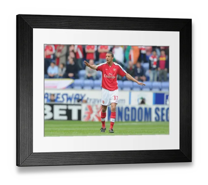 Framed Print : Heartbreaking Performance: Craig Eastmond's Debut in Arsenal's 3-2 Loss to Wigan Athletic (FA Premier League, 2010)