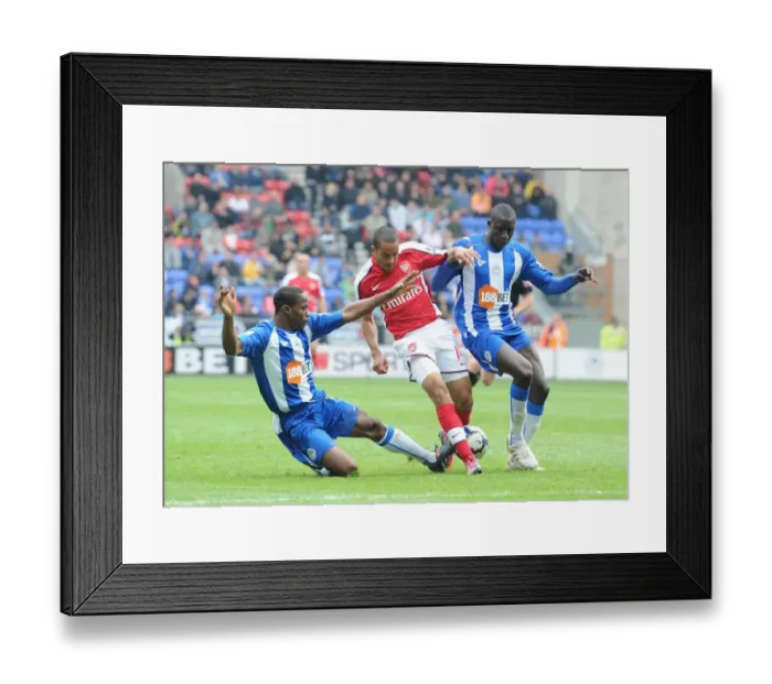 Framed Print : Theo Walcott (Arsenal) Maynor Figueroa and Mohamed Diame (Wigan). Wigan Athletic 3 Framed Print : Theo Walcott (Arsenal) Maynor Figueroa and Mohamed Diame (Wigan). Wigan Athletic 3