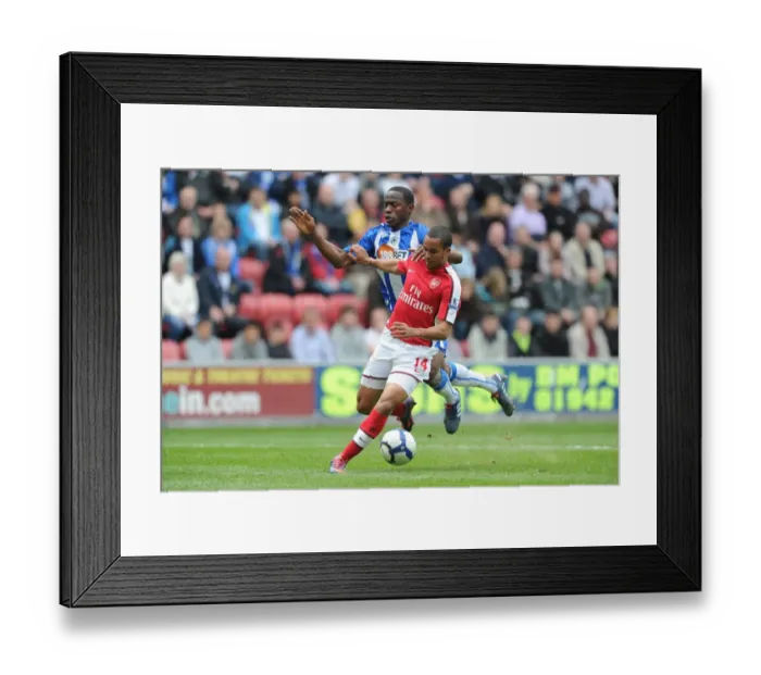 Framed Print : Theo Walcott's Thrilling Goal Past Figueroa: Arsenal's First in 3:2 Comeback at Wigan Framed Print : Theo Walcott's Thrilling Goal Past Figueroa: Arsenal's First in 3:2 Comeback at Wigan