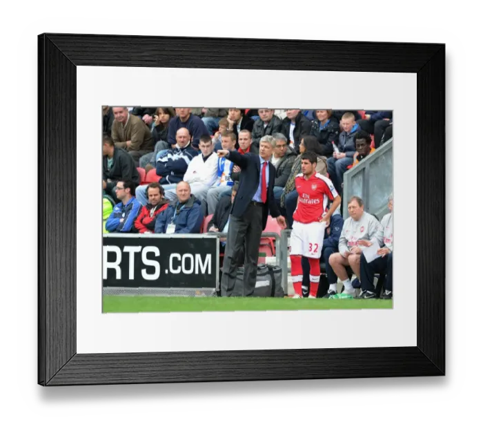 Framed Print : Arsenal manager Arsene Wenger with substitute Fran Merida. Wigan Athletic 3: 2 Arsenal