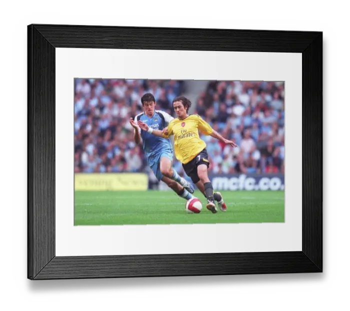 Framed Print : Tomas Rosicky (Arsenal) Joey Barton (Man City) Framed Print : Tomas Rosicky (Arsenal) Joey Barton (Man City)
