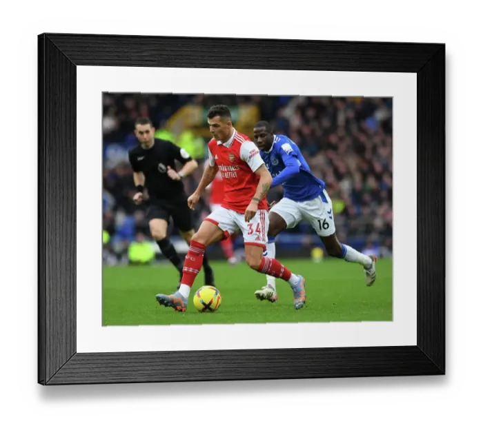 Framed Print : Xhaka vs. Doucoure: Battle at Goodison Park - Everton vs. Arsenal, Premier League 2022-23