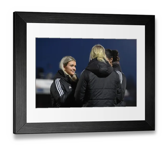 Framed Print : Arsenal Women's Squad in Deep Discussion Ahead of West Ham United Clash (2022-23)