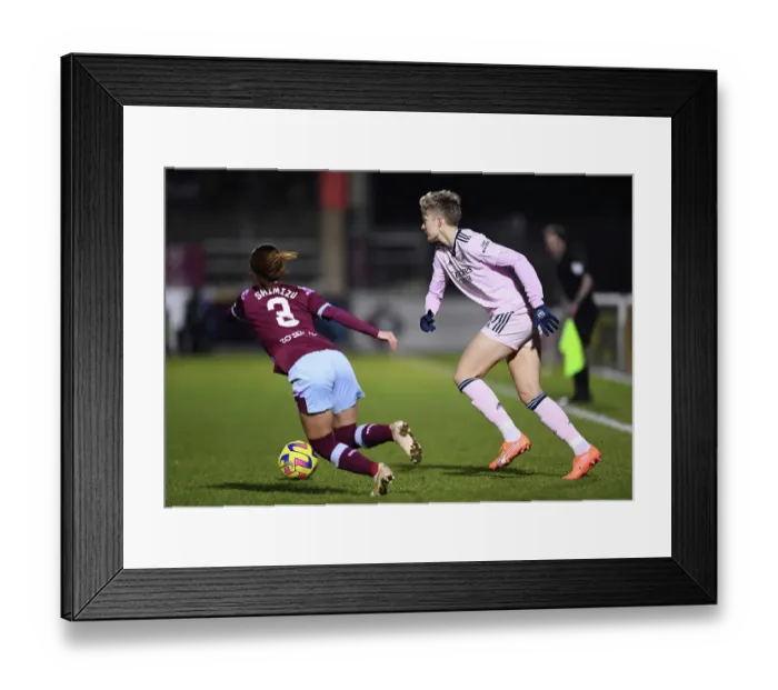 Framed Print : Arsenal's Lina Hurtig Fends Off West Ham's Pressure in Barclays Women's Super League Clash Framed Print : Arsenal's Lina Hurtig Fends Off West Ham's Pressure in Barclays Women's Super League Clash