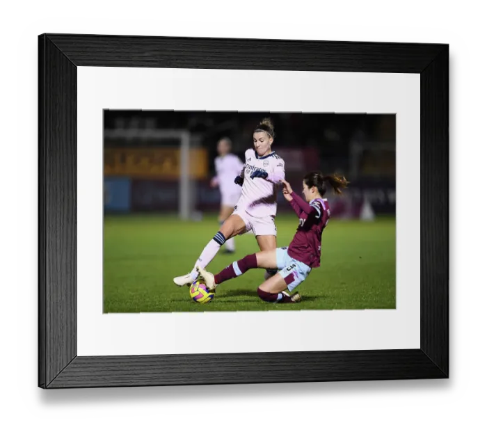 Framed Print : Arsenal vs. West Ham United: Intense Battle in Barclays Women's Super League Framed Print : Arsenal vs. West Ham United: Intense Battle in Barclays Women's Super League