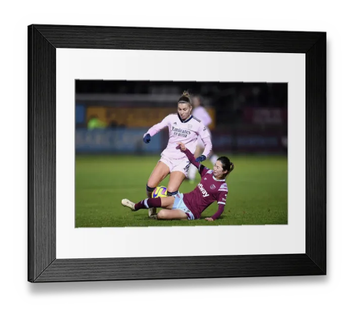 Framed Print : Arsenal's Steph Catley in Action: Barclays FA WSL Showdown between Arsenal Women and West Ham United
