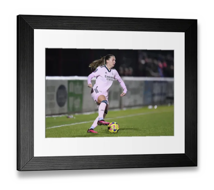 Framed Print : Arsenal vs. West Ham United: Super League Showdown - Arsenal Women's Battle at Chigwell Construction Stadium