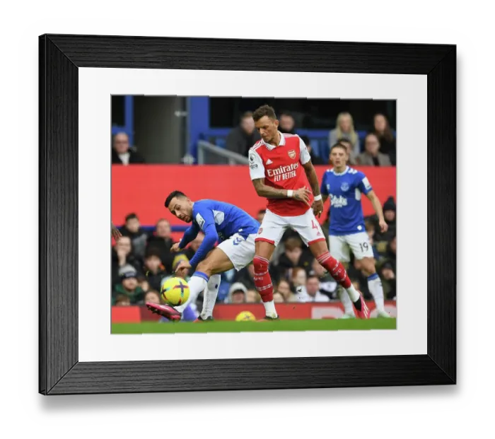 Framed Print : Arsenal's Ben White Clashes with Everton's Dwight McNeil in Premier League Showdown Framed Print : Arsenal's Ben White Clashes with Everton's Dwight McNeil in Premier League Showdown