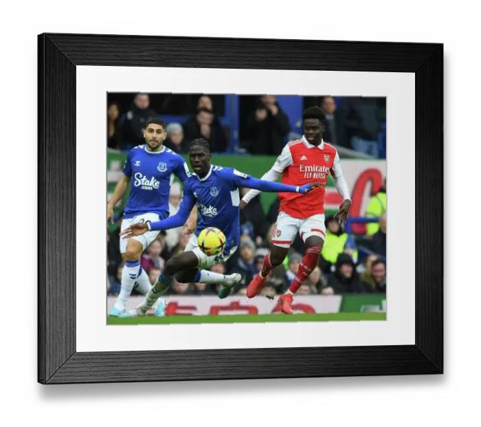 Framed Print : Saka vs Onana: A Premier League Battle at Goodison Park Framed Print : Saka vs Onana: A Premier League Battle at Goodison Park