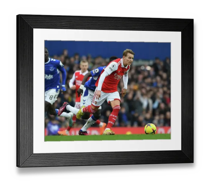Framed Print : Martin Odegaard Breaks Past Everton's Idrissa Gana Gueye in Thrilling Arsenal vs Everton Clash (Premier League 2022-23) Framed Print : Martin Odegaard Breaks Past Everton's Idrissa Gana Gueye in Thrilling Arsenal vs Everton Clash (Premier League 2022-23)